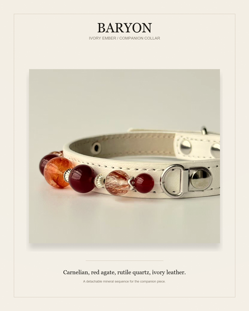 BARYON Ivory Ember editorial product card with ivory leather and warm red orange mineral sequence